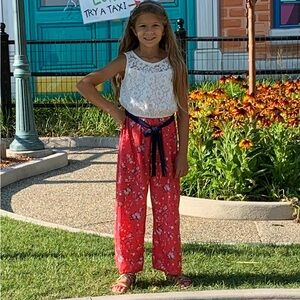 Girls floral jumpsuit by Jenna & Jessie is on like new condition. Size 10
